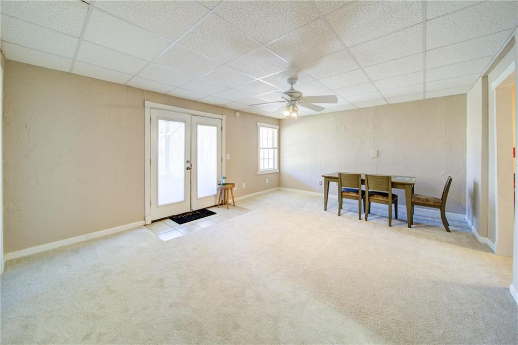 745 Welford Road Northwest Suwanee, GA 30024 - Photo 27 of 32 a view of an empty room with a window