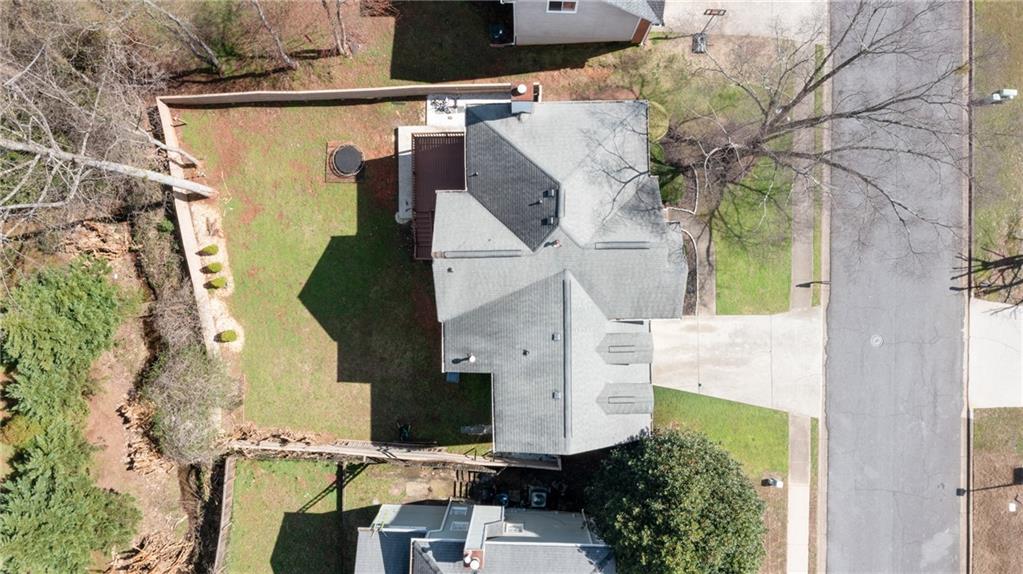 745 Welford Road Northwest Suwanee, GA 30024 - Photo 32 of 32 an aerial view of residential houses with outdoor space