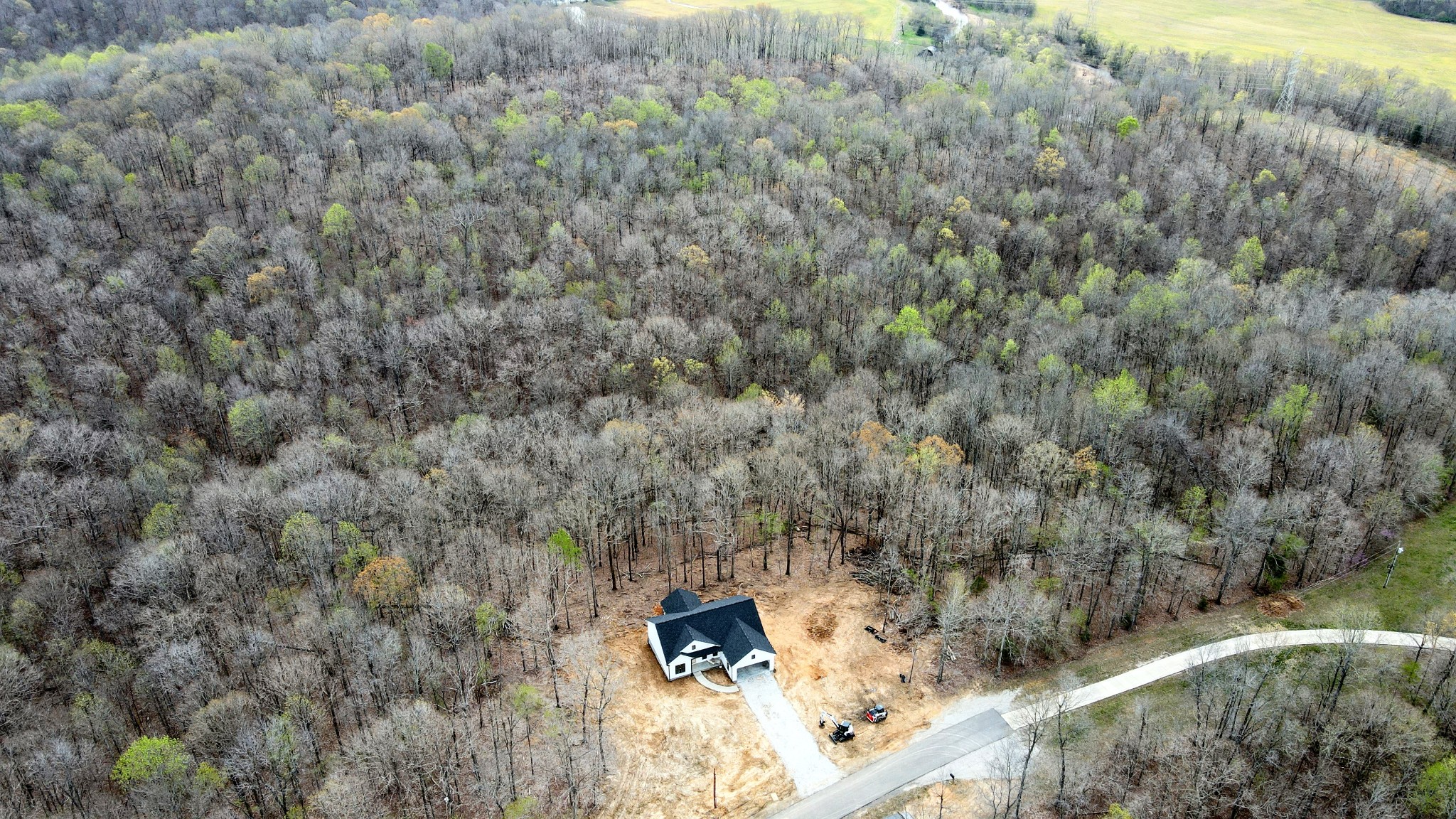 2775 Mayne Trace Road Waverly, TN 37185 - Photo 12 of 43 a view of a city with lush green forest
