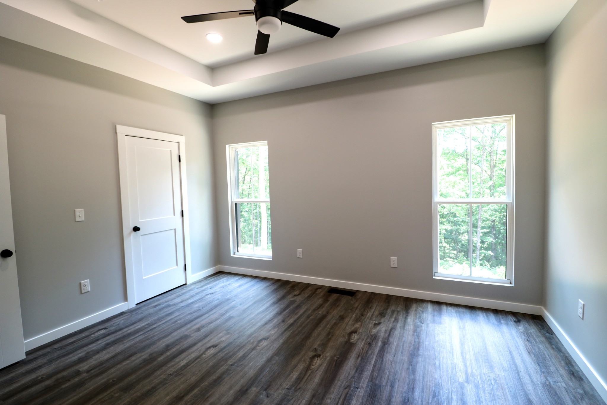 2775 Mayne Trace Road Waverly, TN 37185 - Photo 27 of 43 a view of an empty room with wooden floor and a window