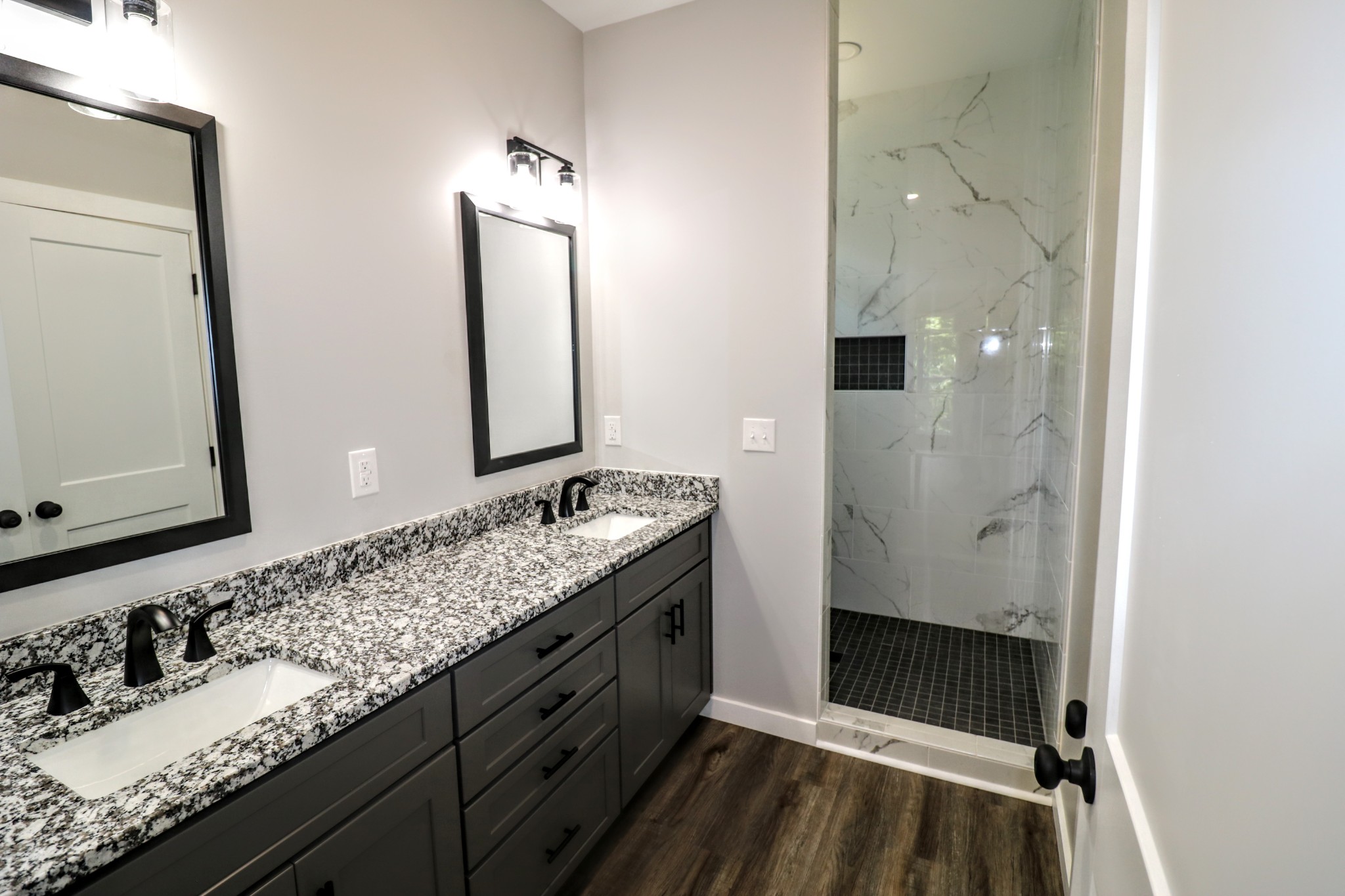 2775 Mayne Trace Road Waverly, TN 37185 - Photo 29 of 43 a bathroom with a sink and a mirror