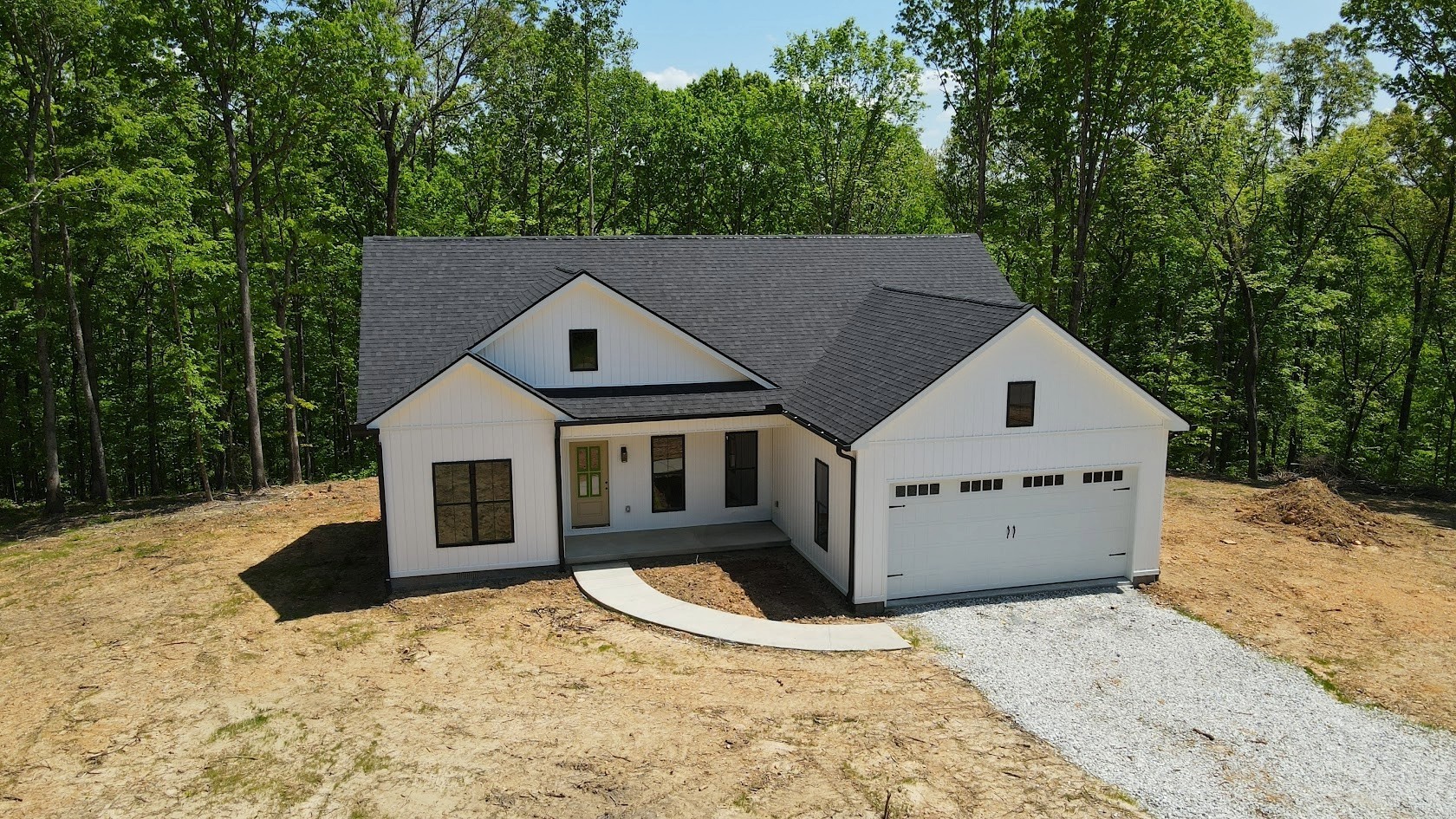 2775 Mayne Trace Road Waverly, TN 37185 - Photo 3 of 43 a view of a house with a yard covered in snow