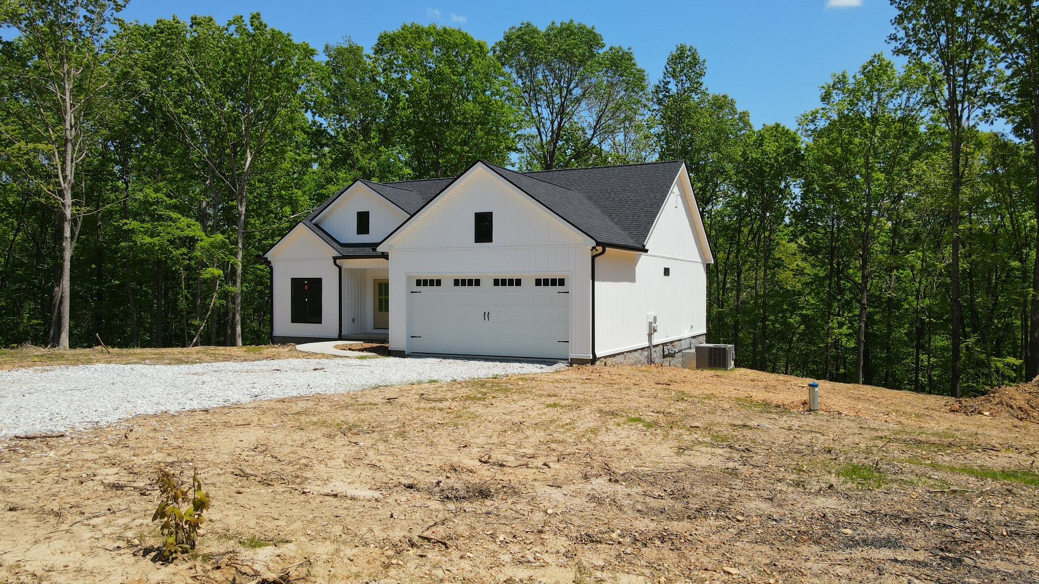 2775 Mayne Trace Road Waverly, TN 37185 - Photo 4 of 43 a front view of a house with a yard
