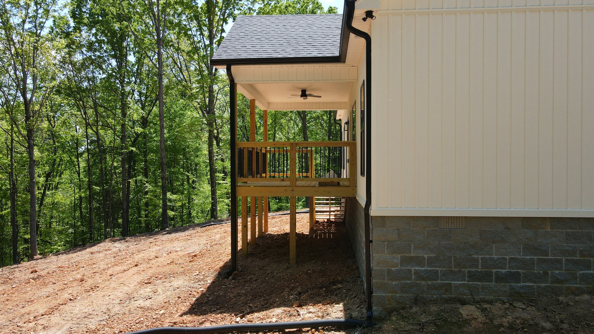 2775 Mayne Trace Road Waverly, TN 37185 - Photo 10 of 43 a view of a porch with a table and chairs