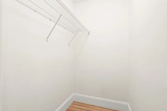 a view of a room with racks on the wall