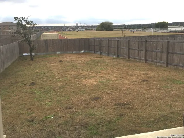 a view of outdoor space and yard