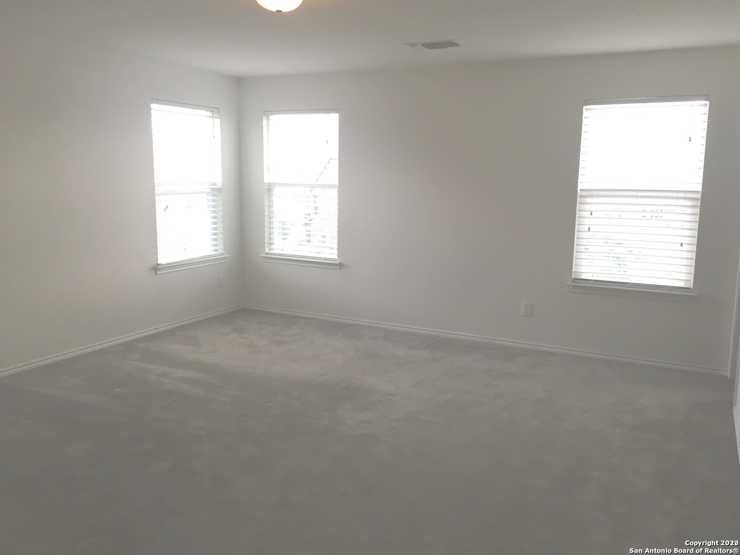 525 Granite Mist Universal City, TX 78148 - Photo 7 of 13 an empty room with a window