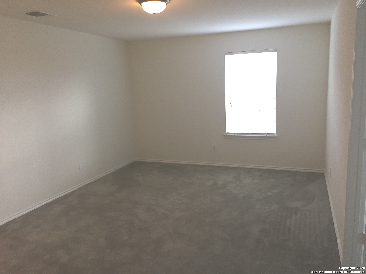 525 Granite Mist Universal City, TX 78148 - Photo 10 of 13 an empty room with a window