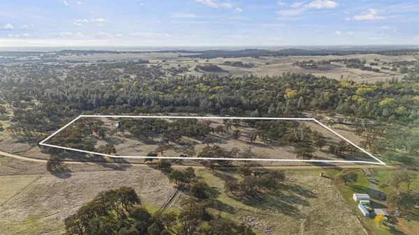 a view of a balcony with an ocean view