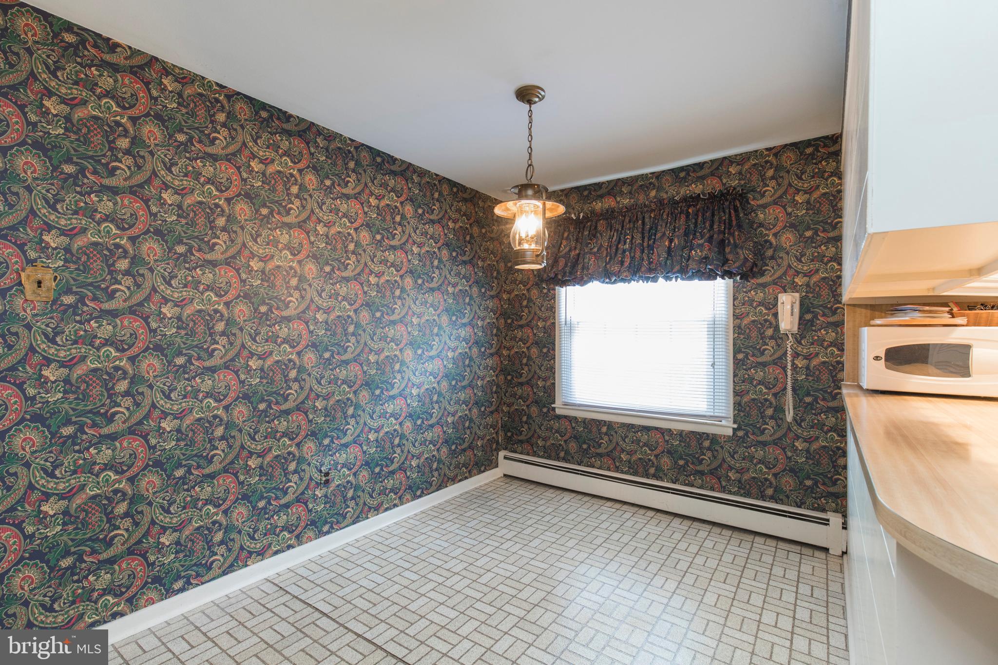 244 Shawnee Road Ardmore, PA 19003 - Photo 13 of 30 a view of an empty room and window