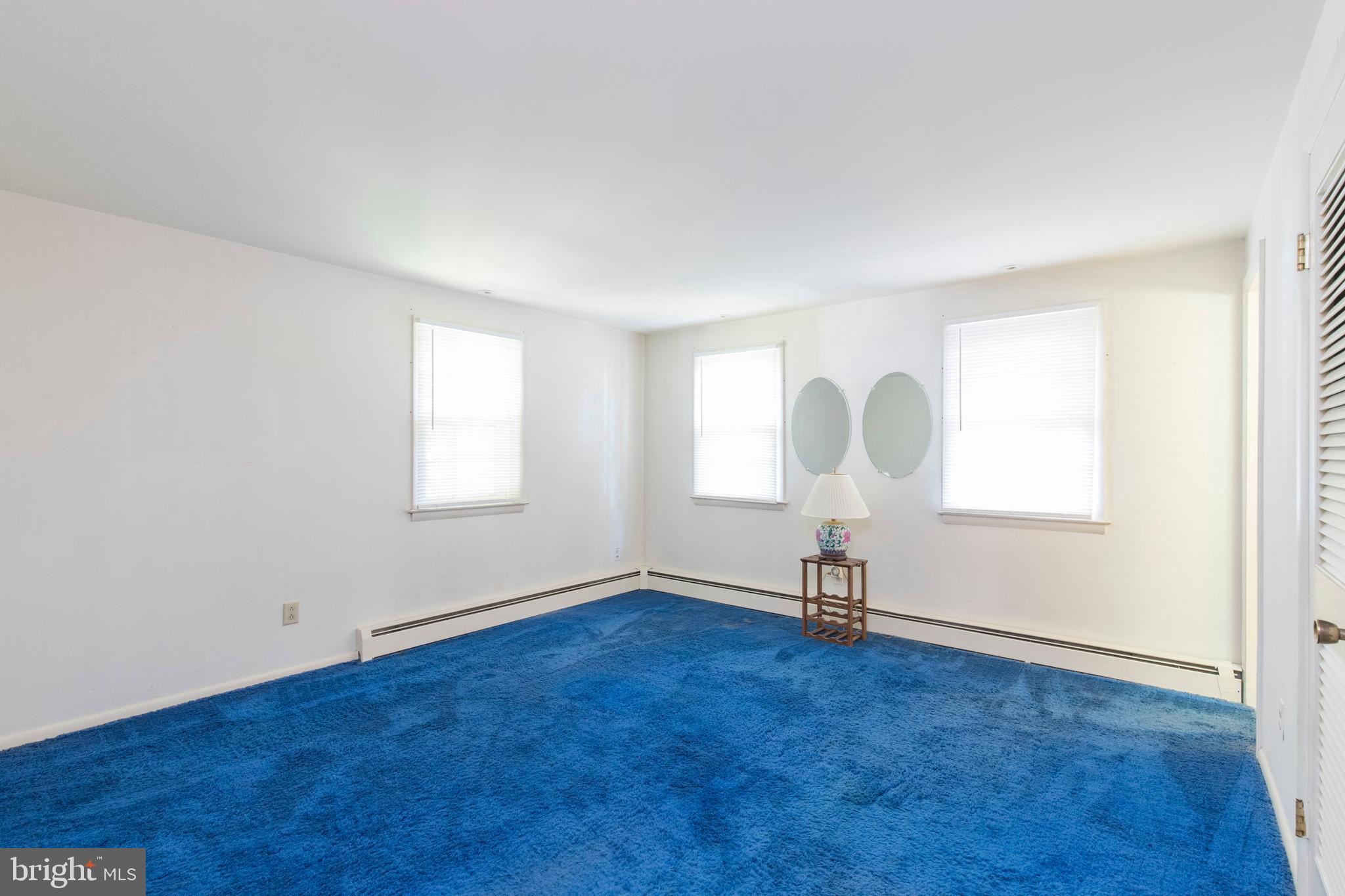 244 Shawnee Road Ardmore, PA 19003 - Photo 17 of 30 a view of a livingroom with wooden floor and a window