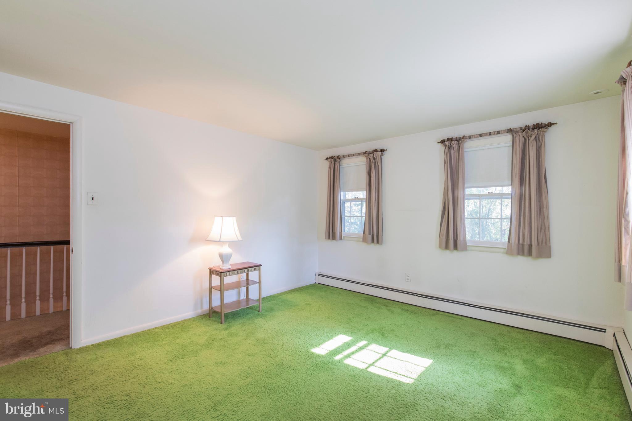 244 Shawnee Road Ardmore, PA 19003 - Photo 23 of 30 a living room with furniture and a window
