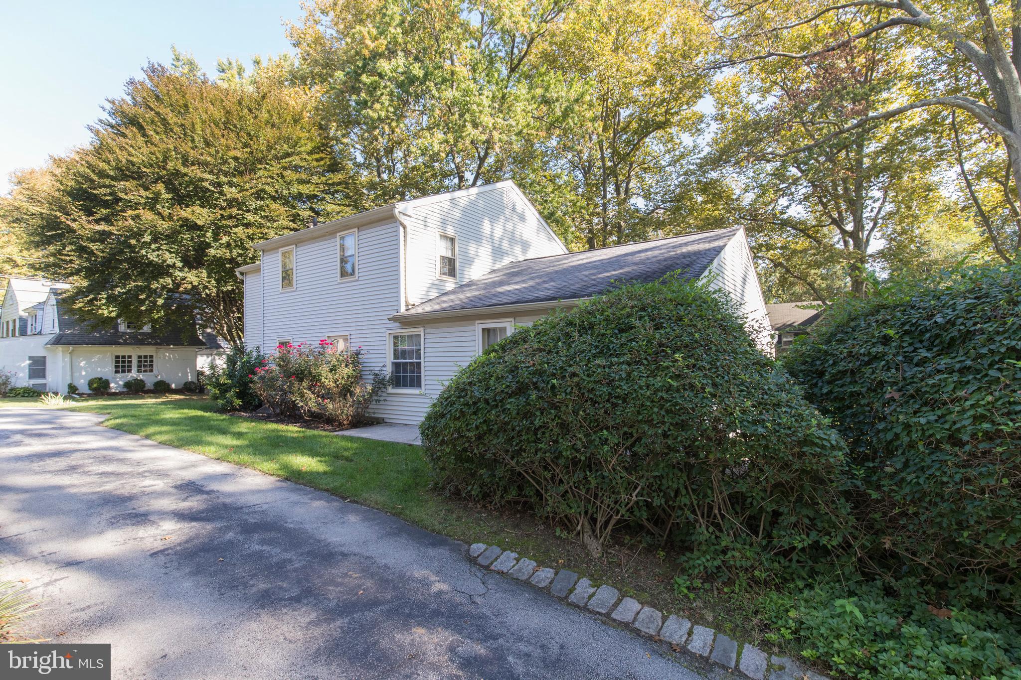244 Shawnee Road Ardmore, PA 19003 - Photo 6 of 30 a view of a house with a yard and large tree