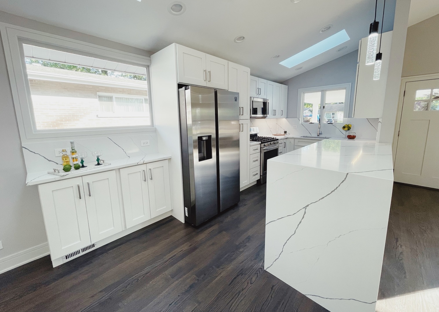 1017 Dell Road Northbrook, IL 60062 - Photo 22 of 52 a kitchen with stainless steel appliances a refrigerator sink and cabinets