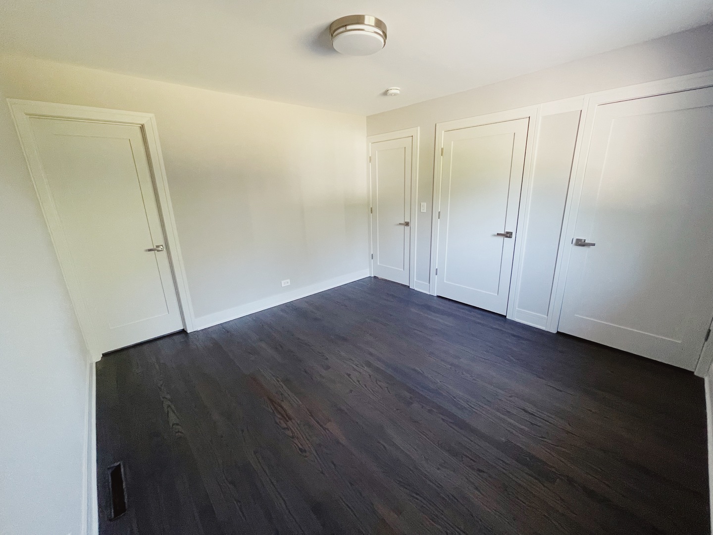 1017 Dell Road Northbrook, IL 60062 - Photo 37 of 52 a view of an empty room with wooden floor