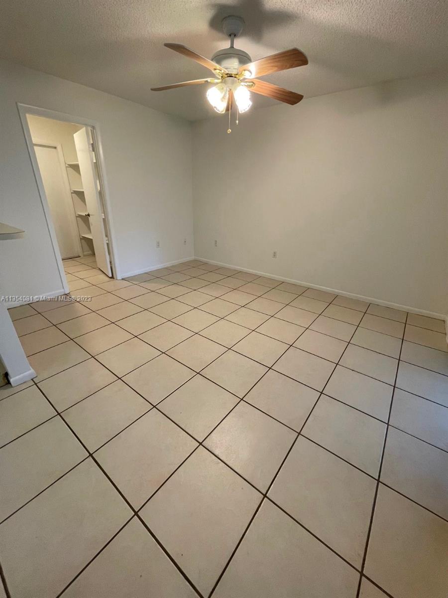 9054 Southwest 112th Place Miami, FL 33176 - Photo 12 of 21 a view of a livingroom and window