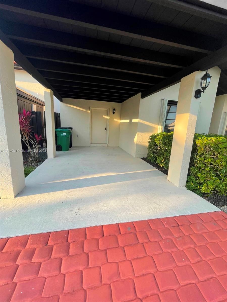 9054 Southwest 112th Place Miami, FL 33176 - Photo 3 of 21 a view of car garage