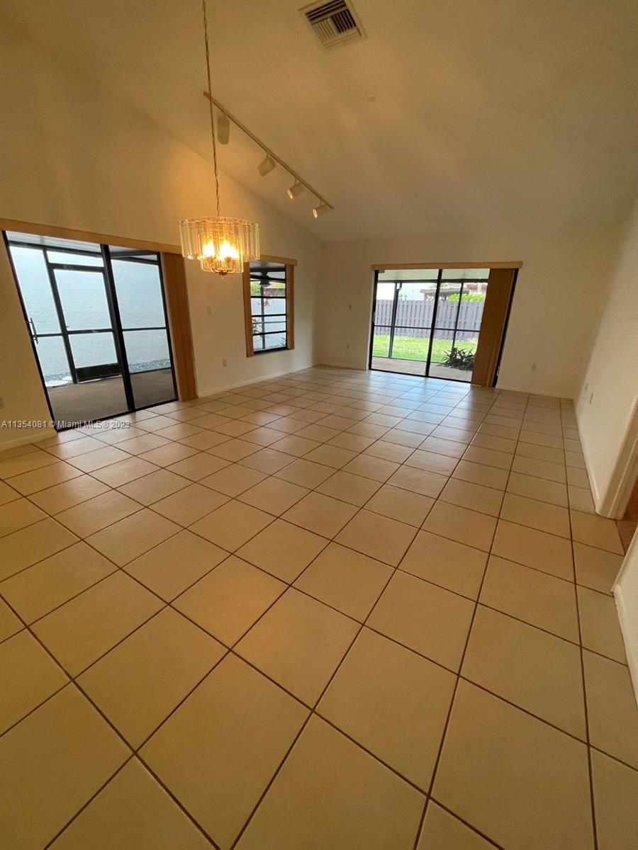 9054 Southwest 112th Place Miami, FL 33176 - Photo 6 of 21 a view of staircase and window