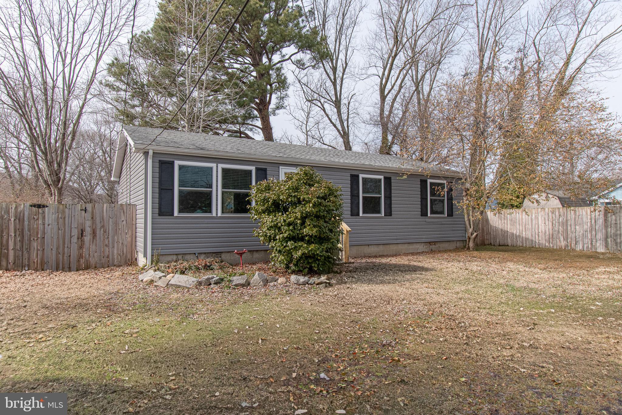 101 Brooks Lane St. Michaels, MD 21663 - Photo 1 of 19 a view of a house with a yard