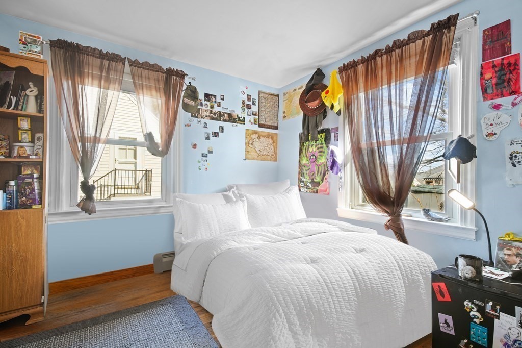 40 Harrison Street Cumberland, RI 02864 - Photo 11 of 37 a bedroom with a bed and a window