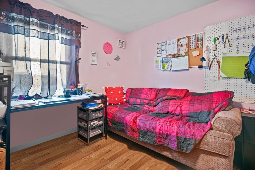 40 Harrison Street Cumberland, RI 02864 - Photo 13 of 37 a living room with furniture and window