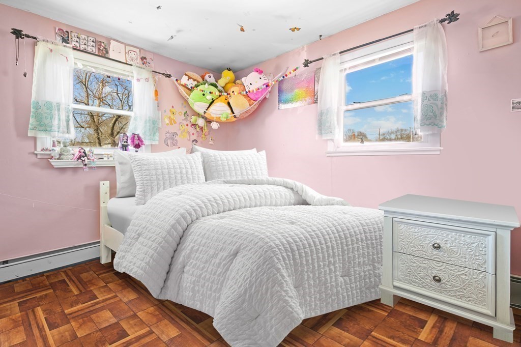 40 Harrison Street Cumberland, RI 02864 - Photo 14 of 37 a bedroom with a bed and a window