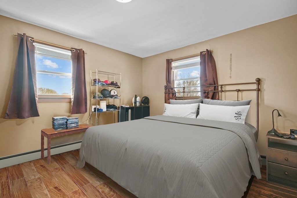 40 Harrison Street Cumberland, RI 02864 - Photo 18 of 37 a bed room with a bed and a window