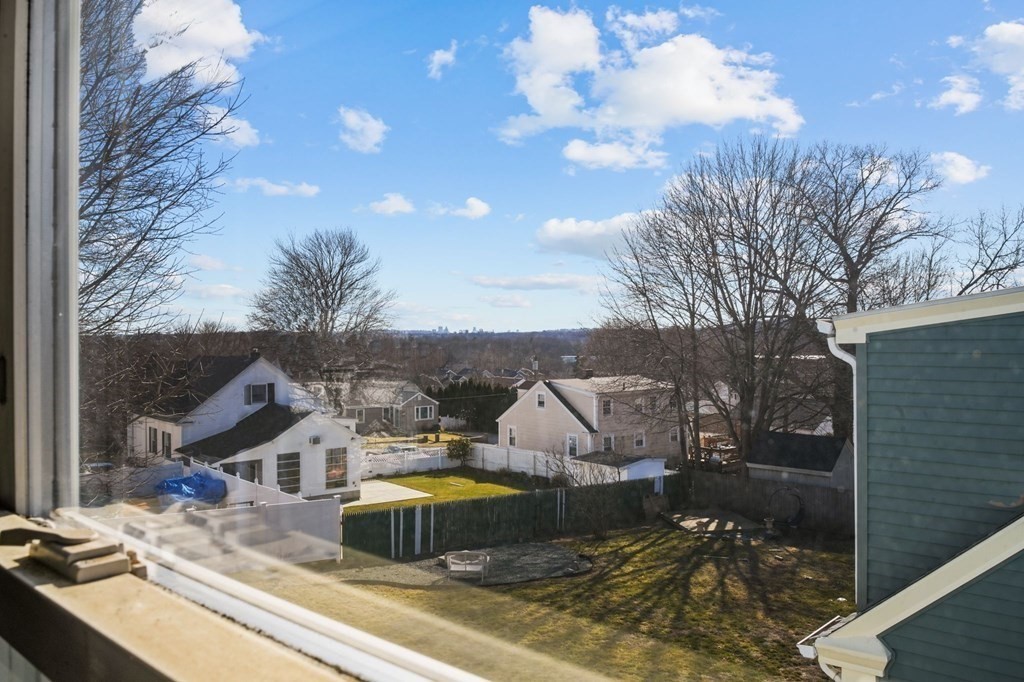 40 Harrison Street Cumberland, RI 02864 - Photo 19 of 37 a view of a houses with sky view