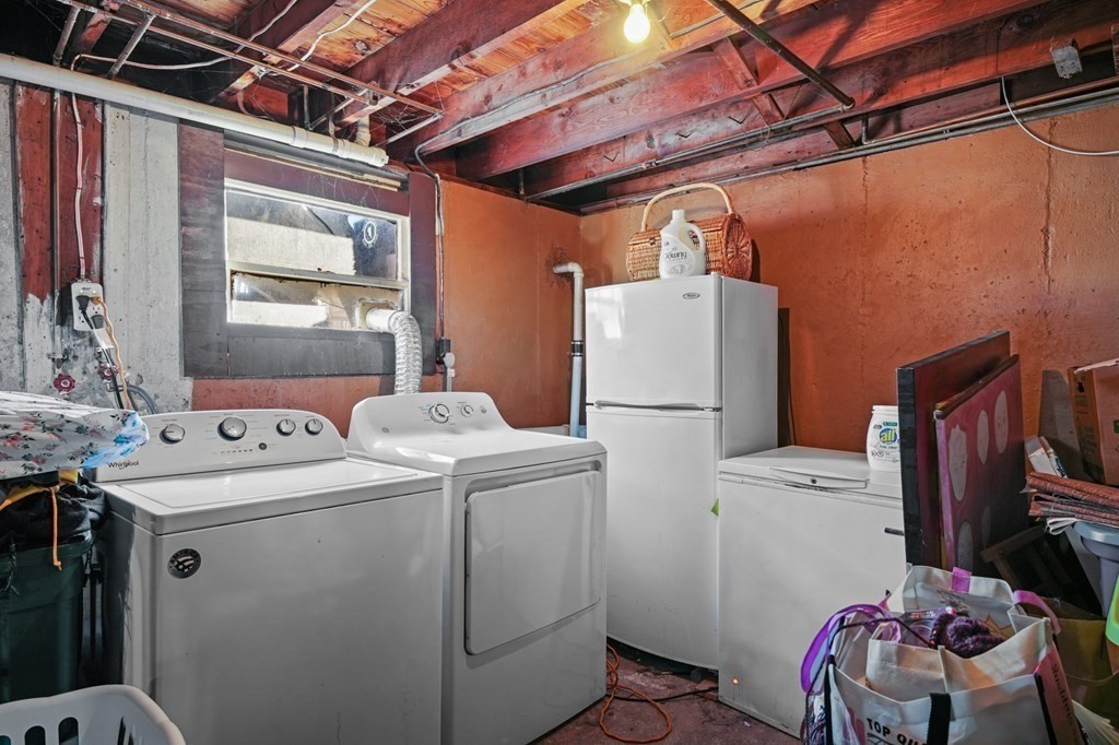 40 Harrison Street Cumberland, RI 02864 - Photo 21 of 37 a utility room with dryer and washer