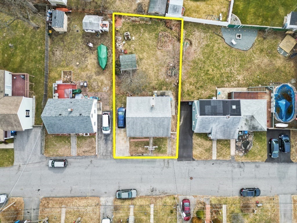 40 Harrison Street Cumberland, RI 02864 - Photo 28 of 37 a bathroom with a tub sink and mirror