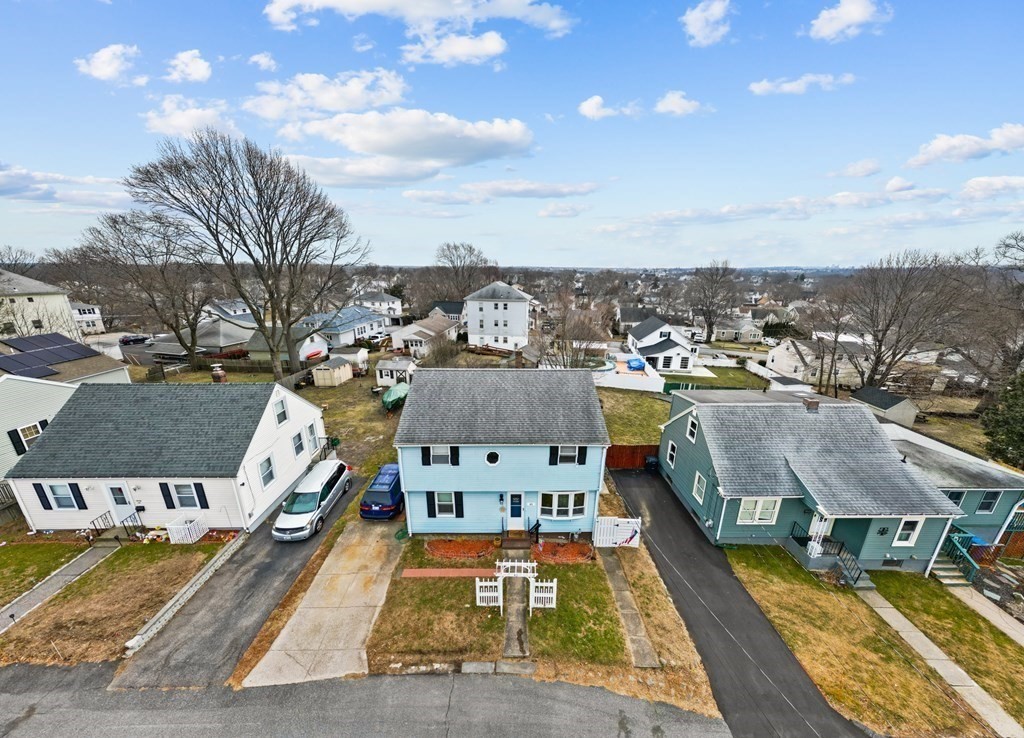 40 Harrison Street Cumberland, RI 02864 - Photo 33 of 37 an aerial view of a house with a swimming pool