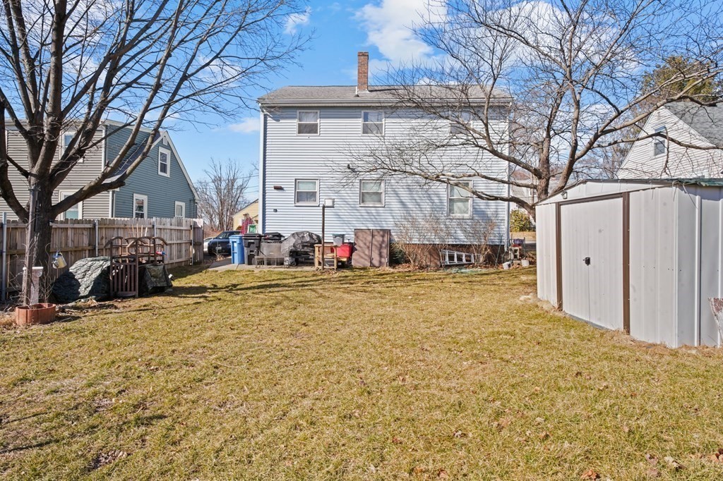 40 Harrison Street Cumberland, RI 02864 - Photo 37 of 37 a view of the house with snow on the road