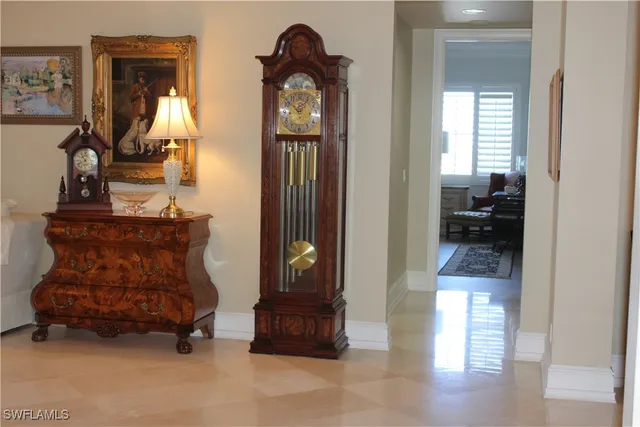 a room with furniture and a mirror