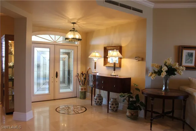 a view of a livingroom with furniture and a table