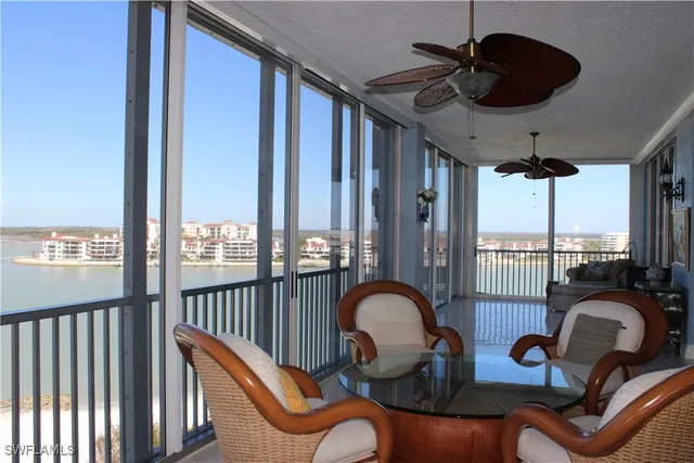 a very nice looking living room with a large window
