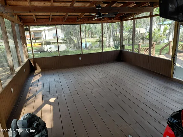 a kitchen with stainless steel appliances a refrigerator and a cabinets