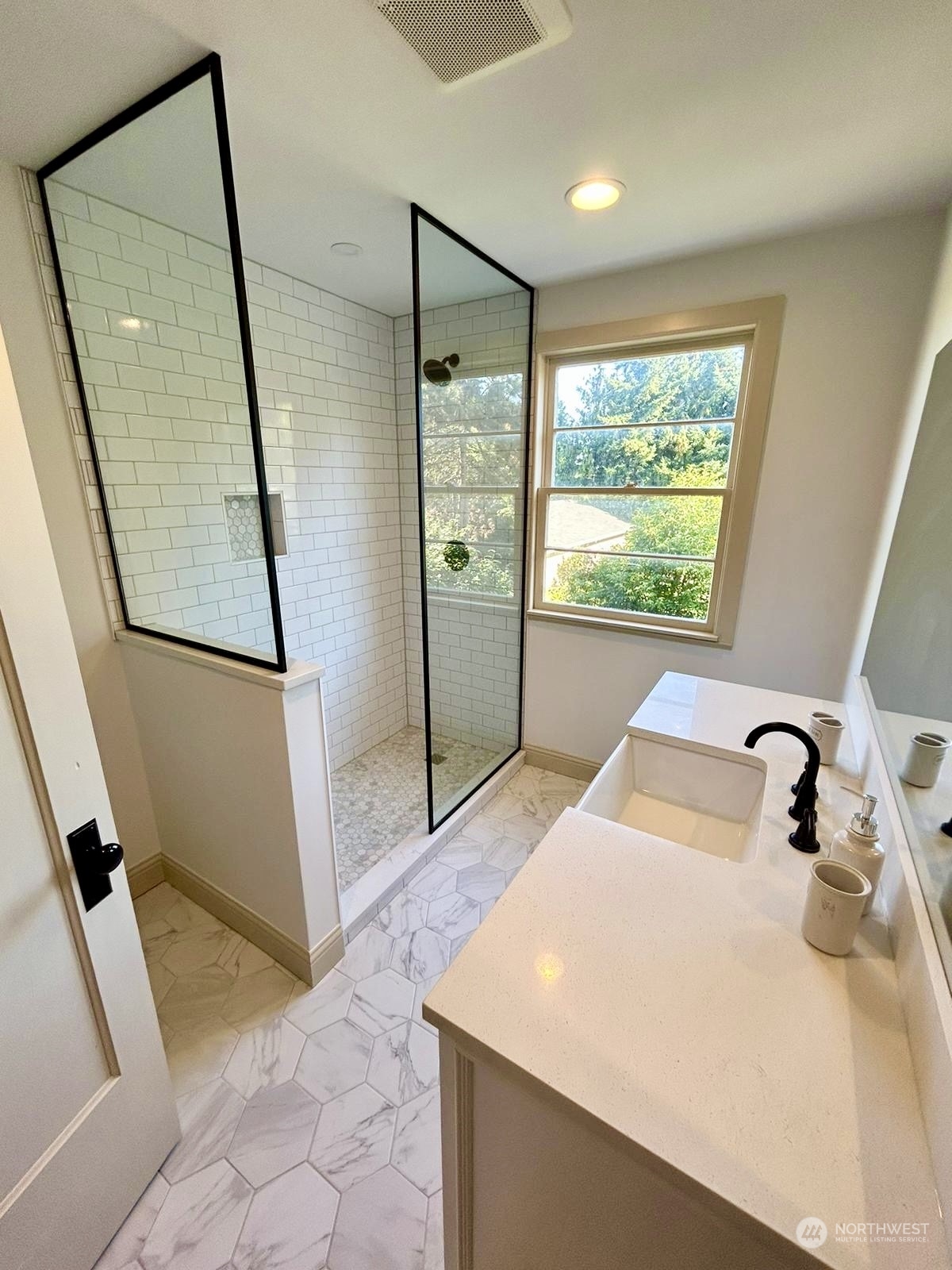 12325 Old Snohomish Monroe Road Snohomish, WA 98290 - Photo 19 of 40 a bathroom with a sink and a large mirror
