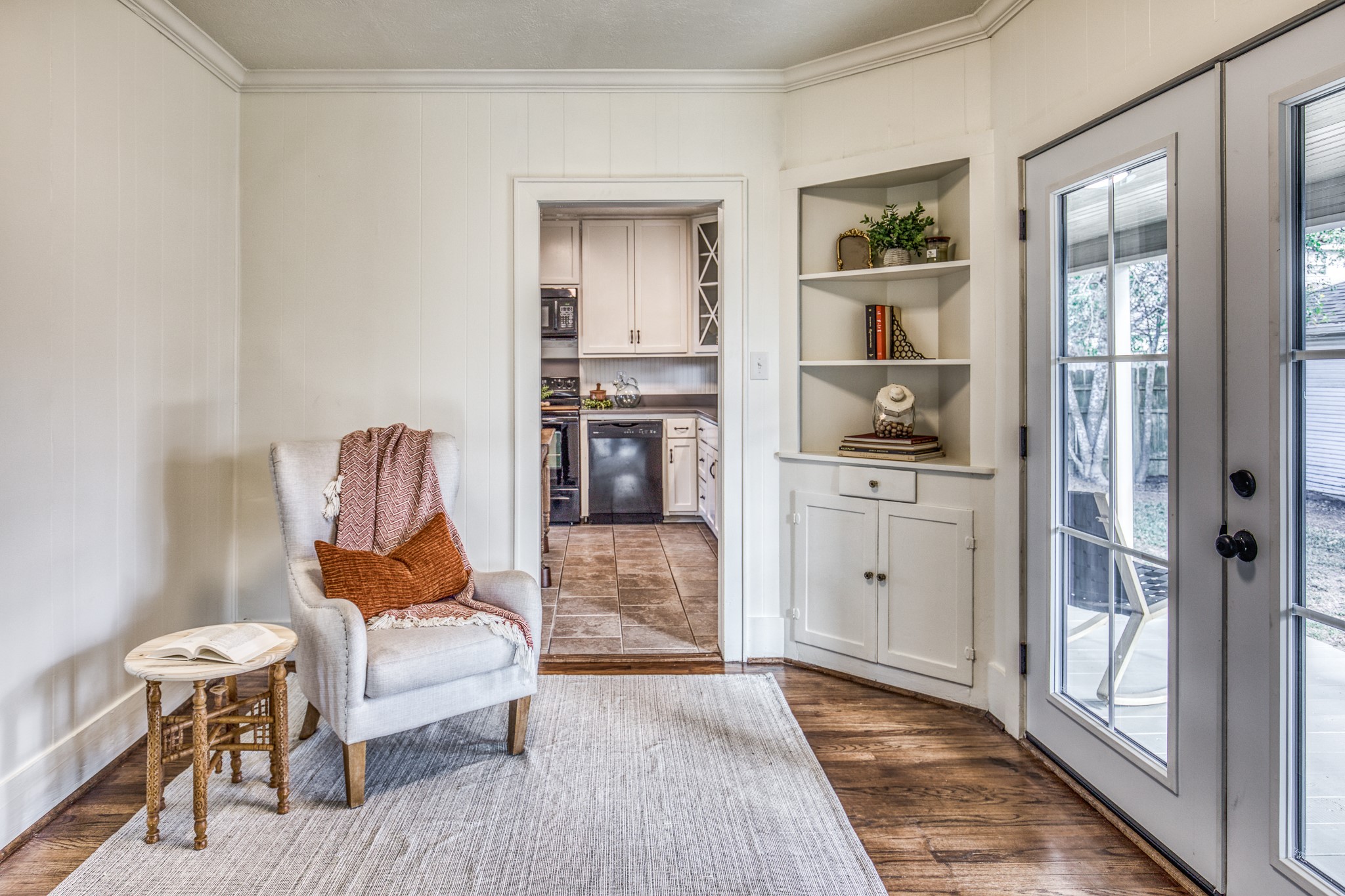 602 Alma Street Brenham, TX 77833 - Photo 11 of 20 a living room with furniture and a kitchen