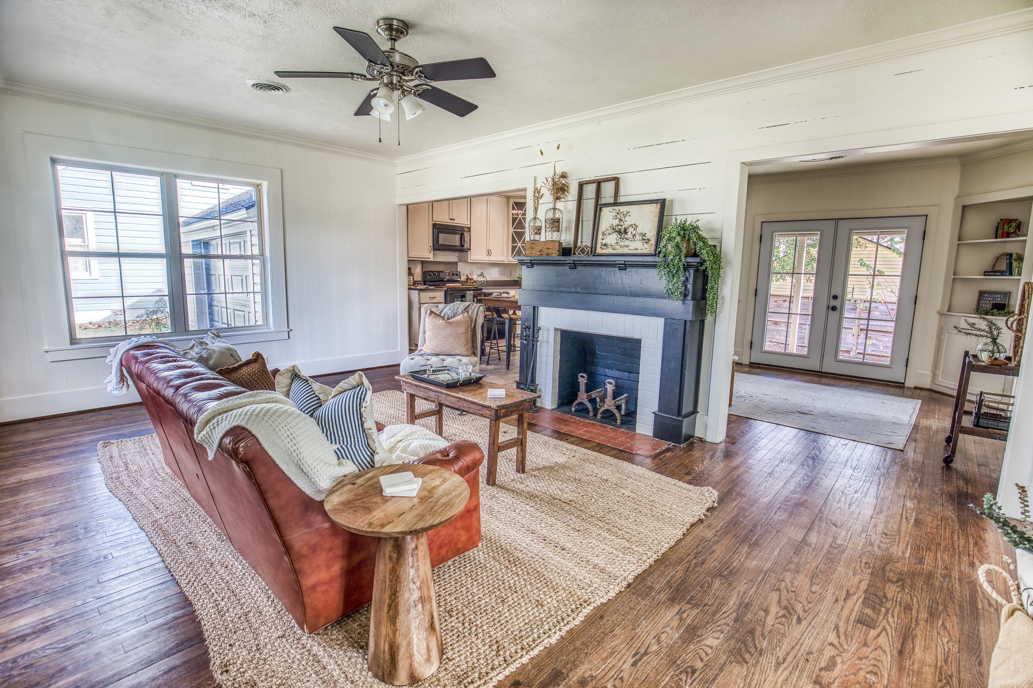 602 Alma Street Brenham, TX 77833 - Photo 3 of 20 a living room with furniture and a fireplace