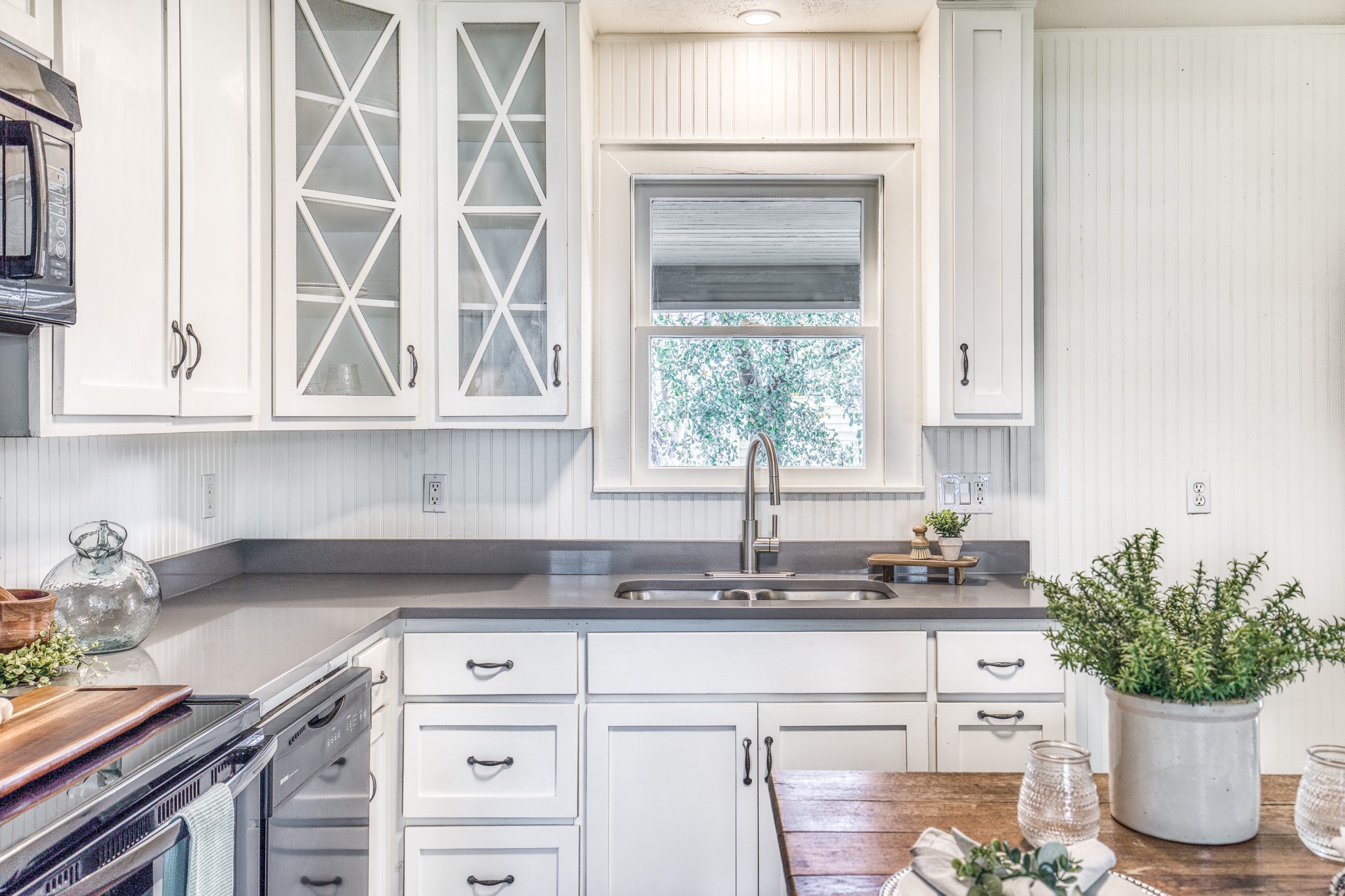 602 Alma Street Brenham, TX 77833 - Photo 8 of 20 a kitchen with a sink cabinets and window