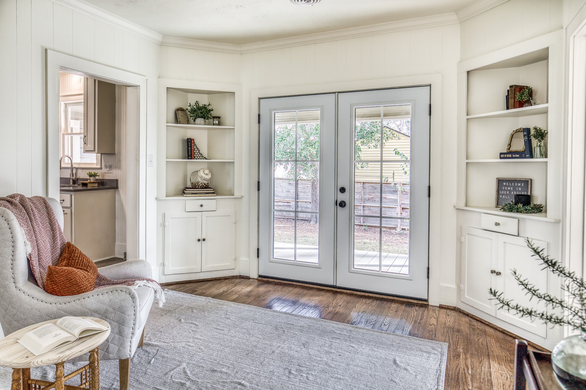 602 Alma Street Brenham, TX 77833 - Photo 10 of 20 a living room with furniture a rug and a window