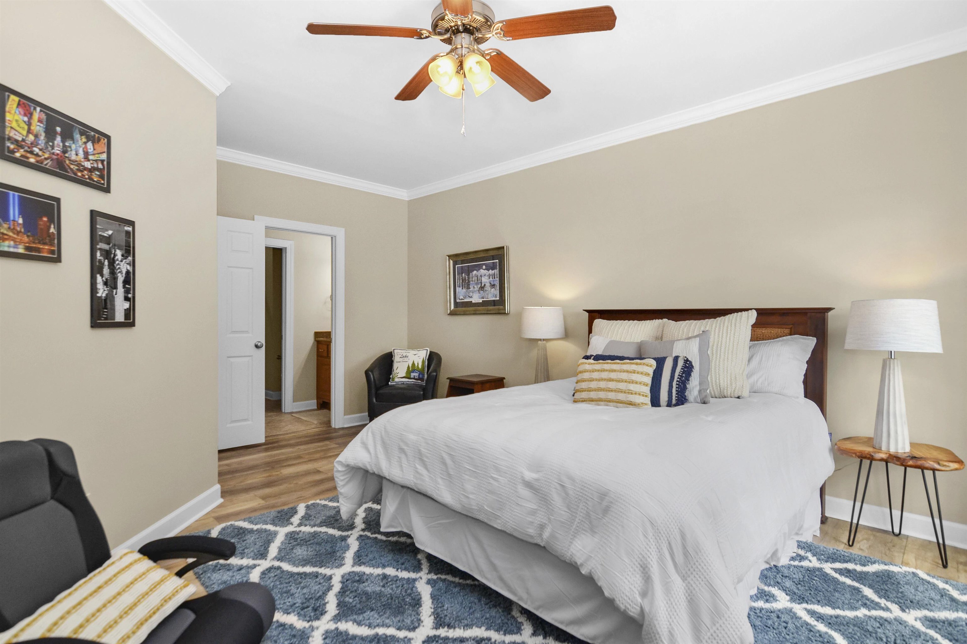 505 Sailboat Point Savannah, TN 38372 - Photo 24 of 40 a bedroom with a bed and wooden floor
