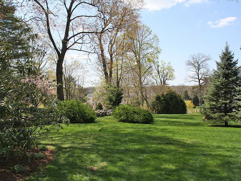 28 Leeward Lane Riverside, CT 06878 - Photo 20 of 23 a view of a grassy field with trees