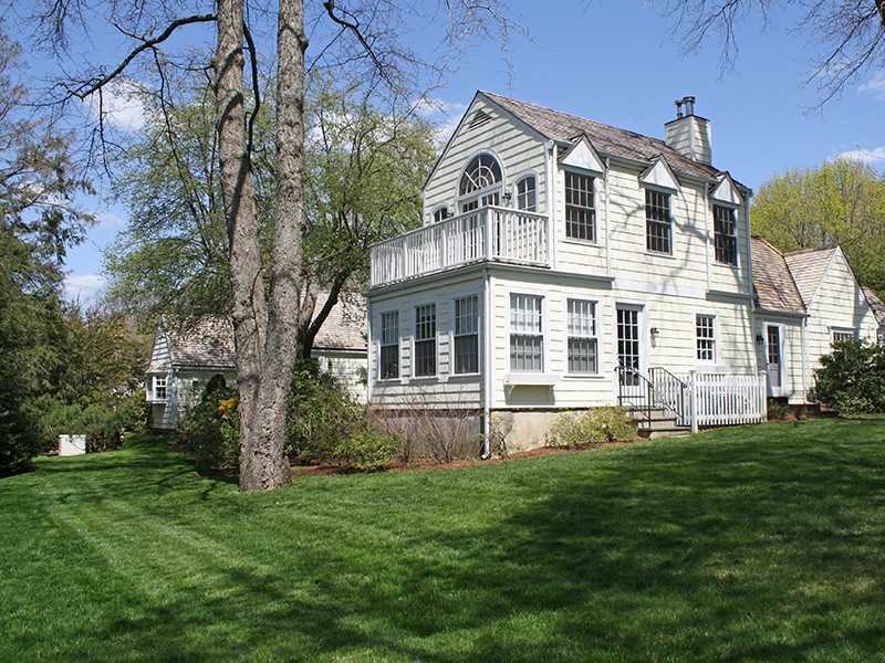 28 Leeward Lane Riverside, CT 06878 - Photo 21 of 23 a front view of a house with a yard
