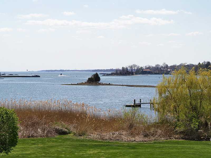 28 Leeward Lane Riverside, CT 06878 - Photo 23 of 23 a view of a lake with houses in the back