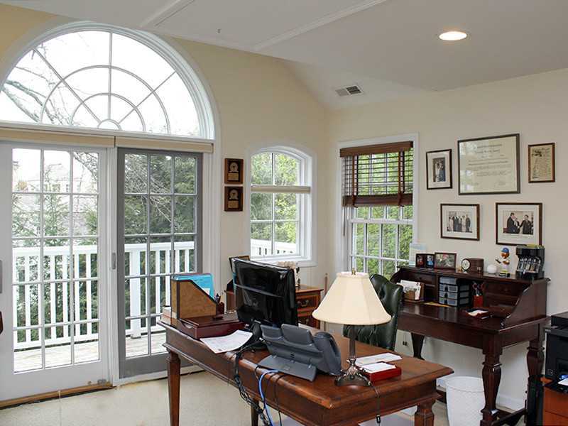28 Leeward Lane Riverside, CT 06878 - Photo 9 of 23 a living room with furniture and a large window