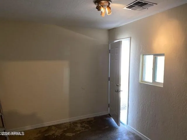 an empty room with a window