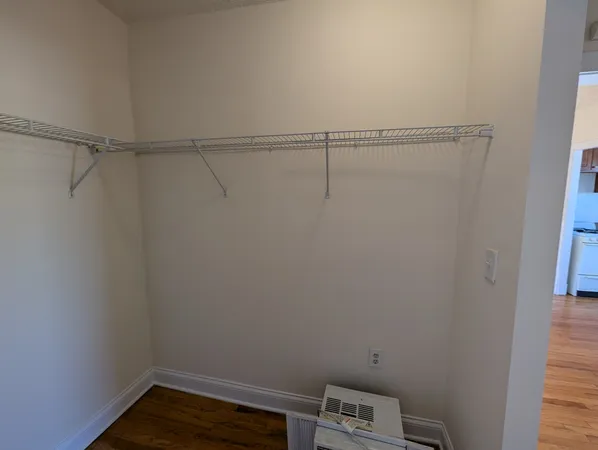 a view of small space with racks on the wall