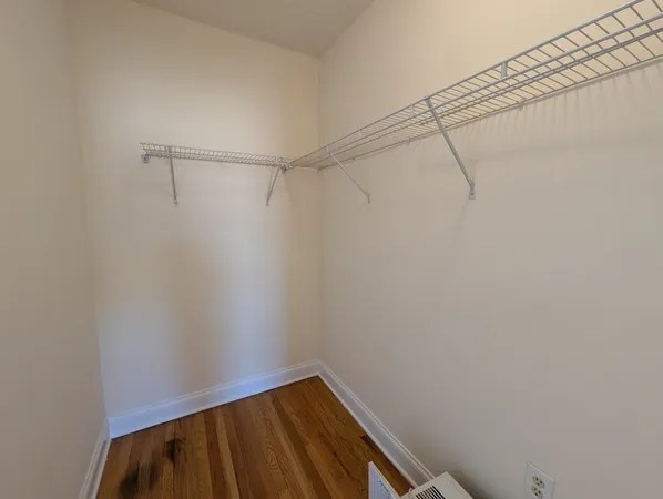 a view of small space with racks on the wall