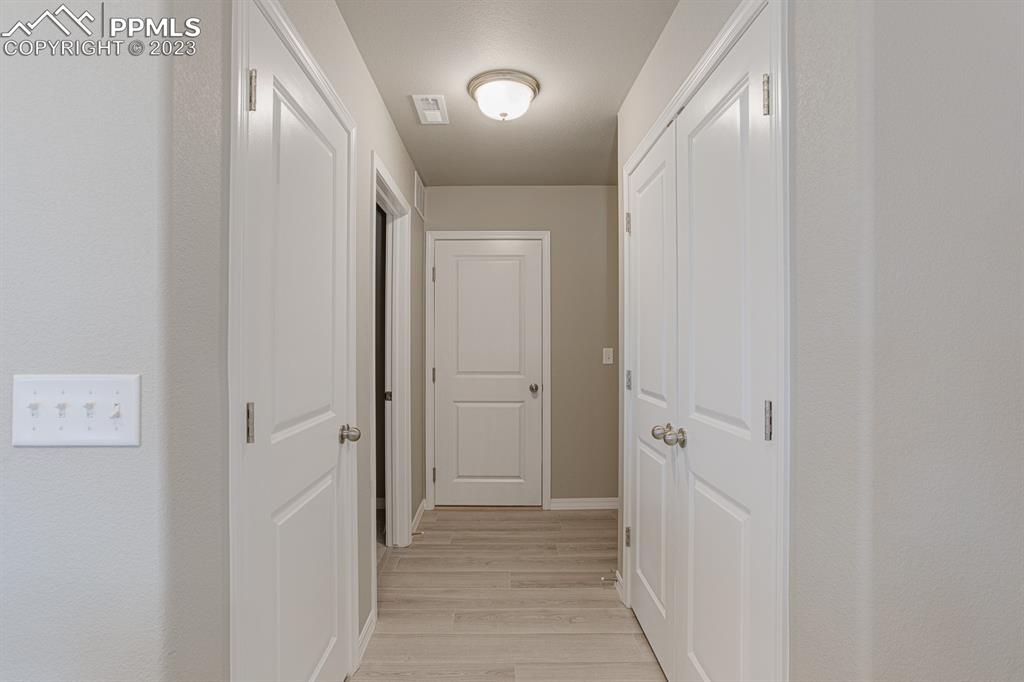 4336 Samaritan Loop Colorado Springs, CO 80916 - Photo 13 of 22 a view of a hallway